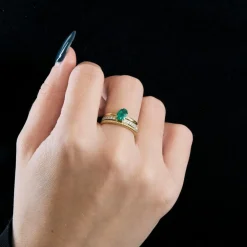 Bague multi-anneaux or jaune platine diamants et émeraude.