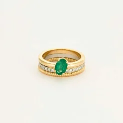 Bague multi-anneaux or jaune platine diamants et émeraude.