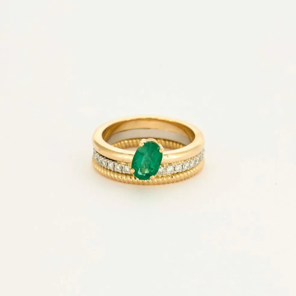 Bague multi-anneaux or jaune platine diamants et émeraude.