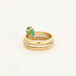 Bague multi-anneaux or jaune platine diamants et émeraude.