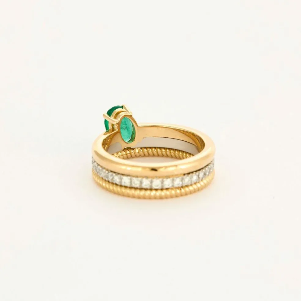 Bague multi-anneaux or jaune platine diamants et émeraude.