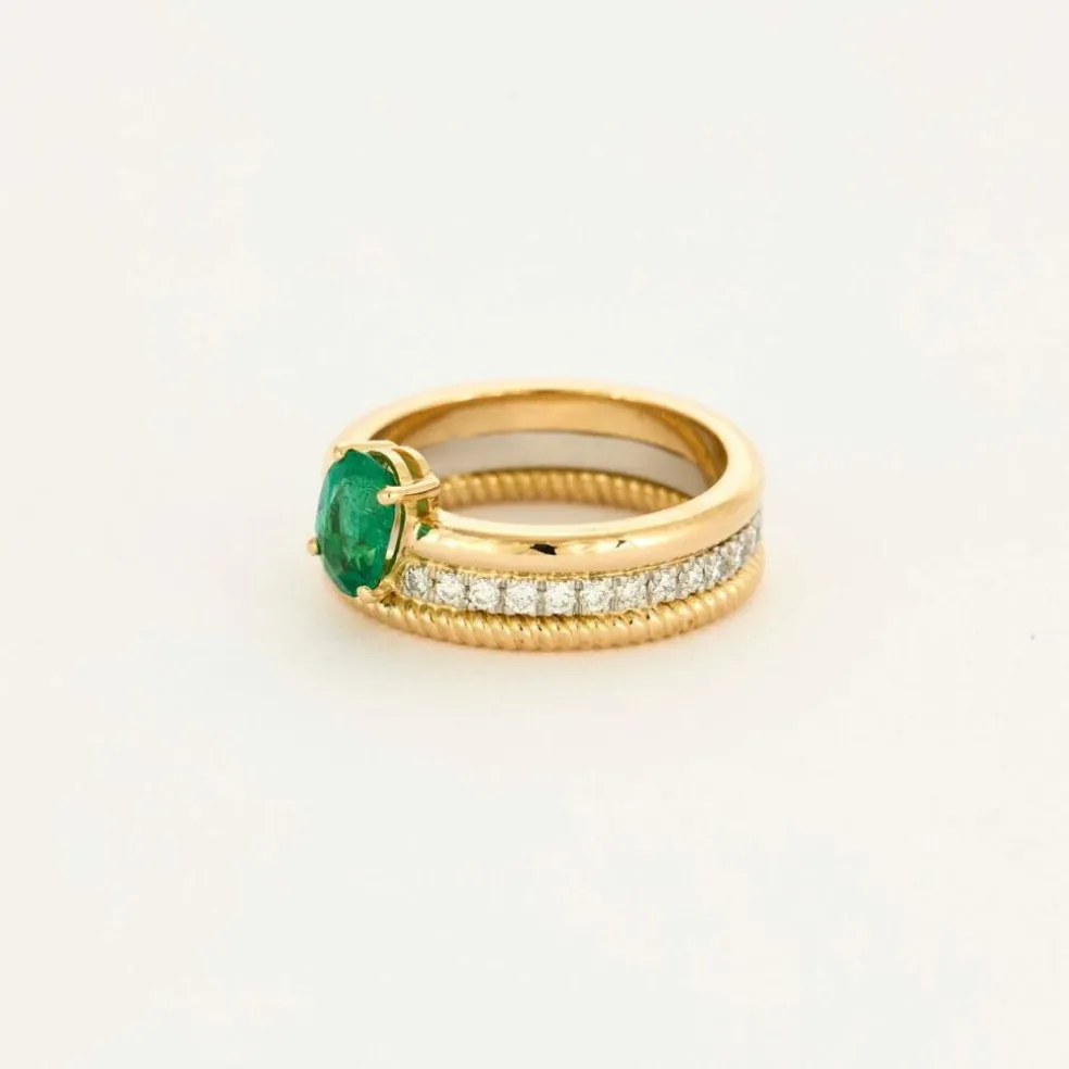 Bague multi-anneaux or jaune platine diamants et émeraude.