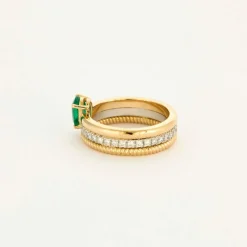 Bague multi-anneaux or jaune platine diamants et émeraude.