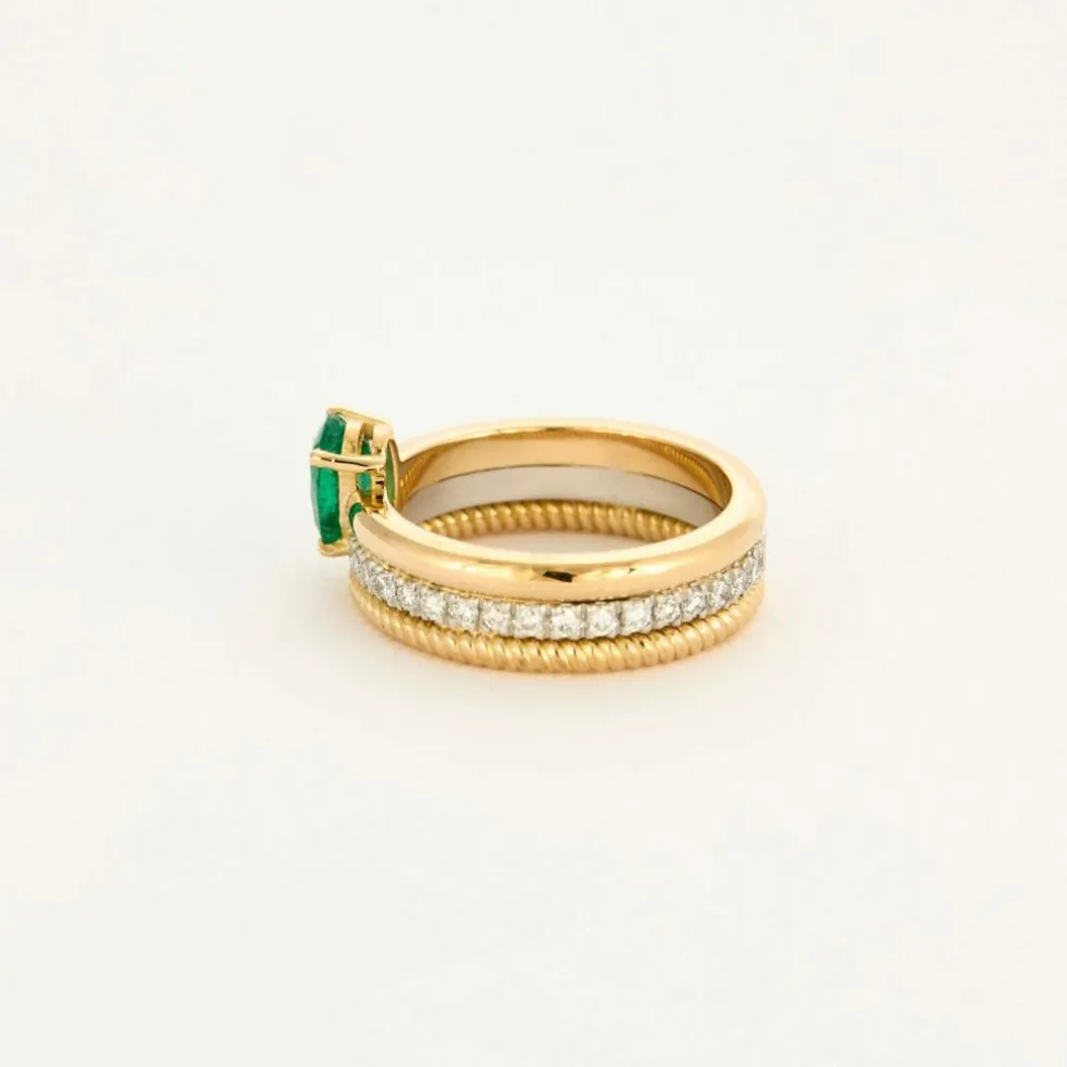 Bague multi-anneaux or jaune platine diamants et émeraude.