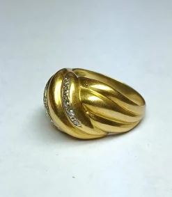 Bague noeud en or jaune gris et diamants