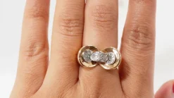 Bague nœud en or rose platine et diamants