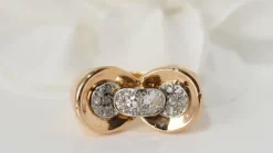 Bague nœud en or rose platine et diamants