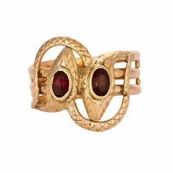 Bague or bicolore motif serpent et grenats