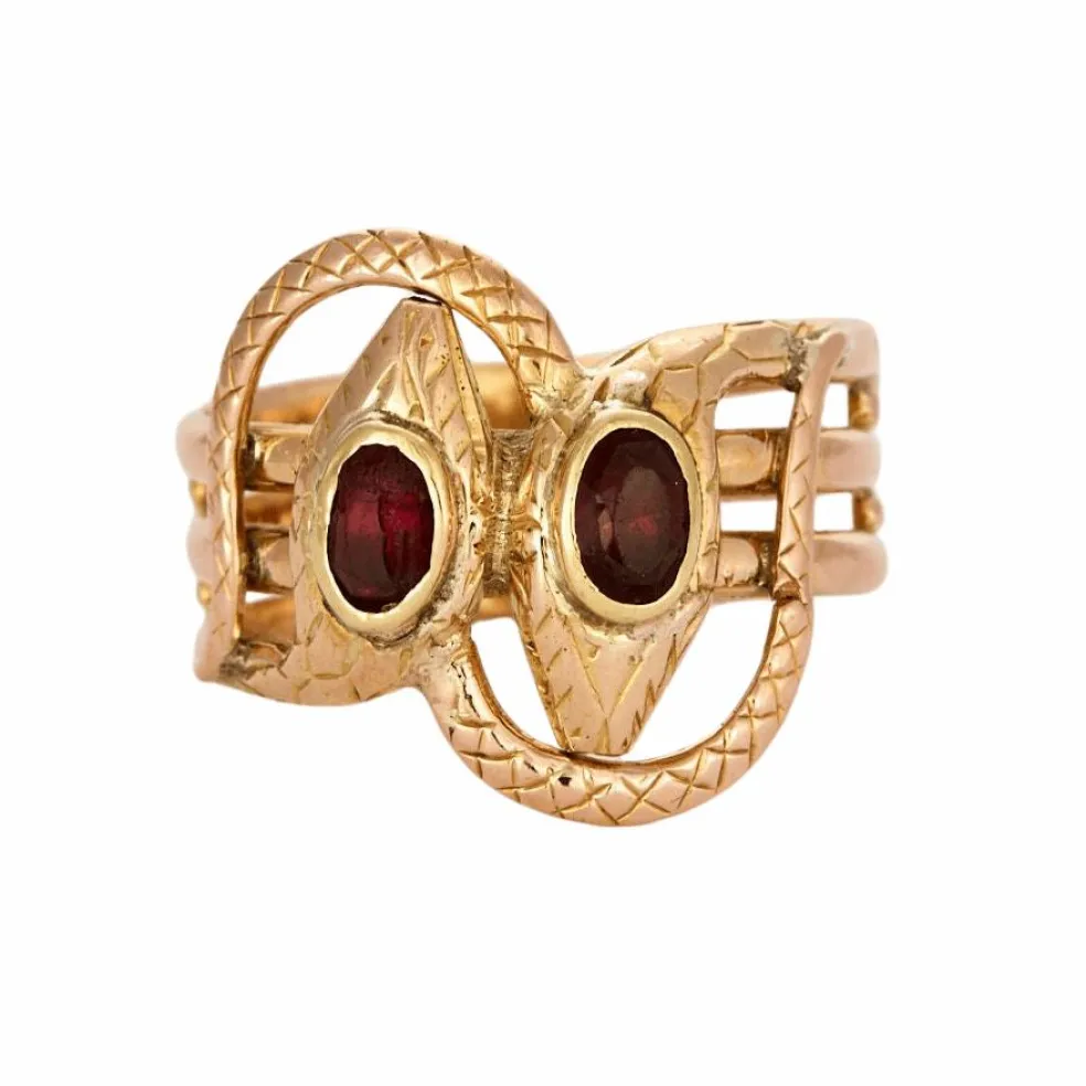 Bague or bicolore motif serpent et grenats