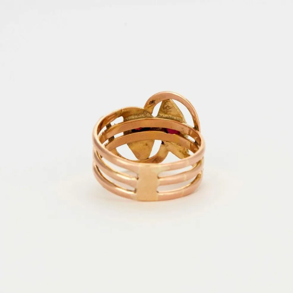 Bague or bicolore motif serpent et grenats