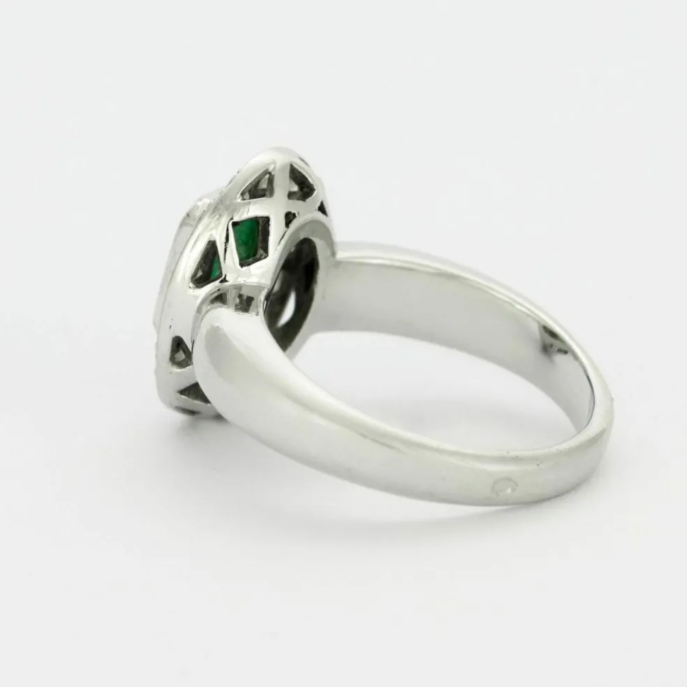Bague or blanc avec émeraude et diamants