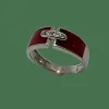 Bague or blanc en résine rouge et diamants