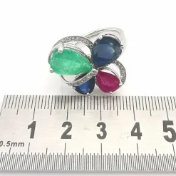 Bague or blanc et pierres précieuses