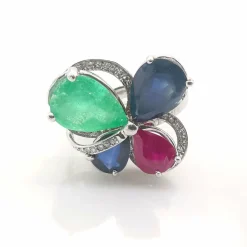 Bague or blanc et pierres précieuses