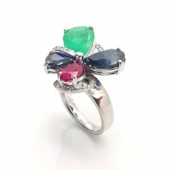 Bague or blanc et pierres précieuses