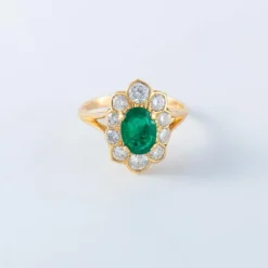 Bague or, diamants et émeraude