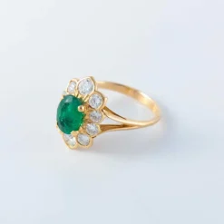 Bague or, diamants et émeraude