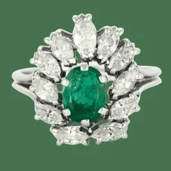 Bague or gris, émeraude et diamants