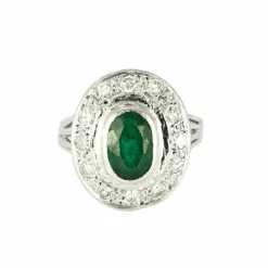 Bague or gris, émeraude et diamants