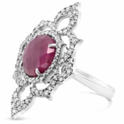 Bague or gris rubis diamants