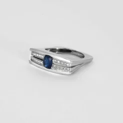 Bague or gris saphir et diamants