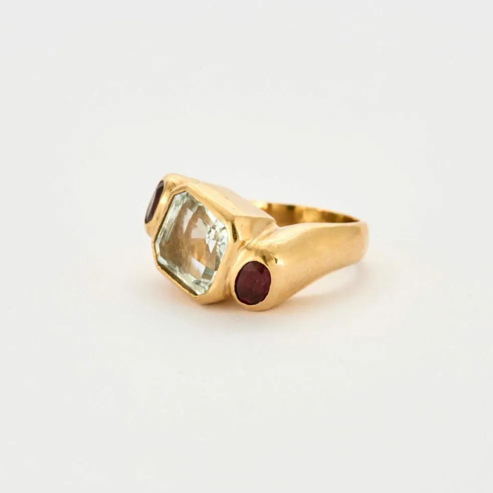 Bague or jaune aigue marine et grenats