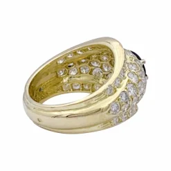 Bague or jaune, diamants et saphir.