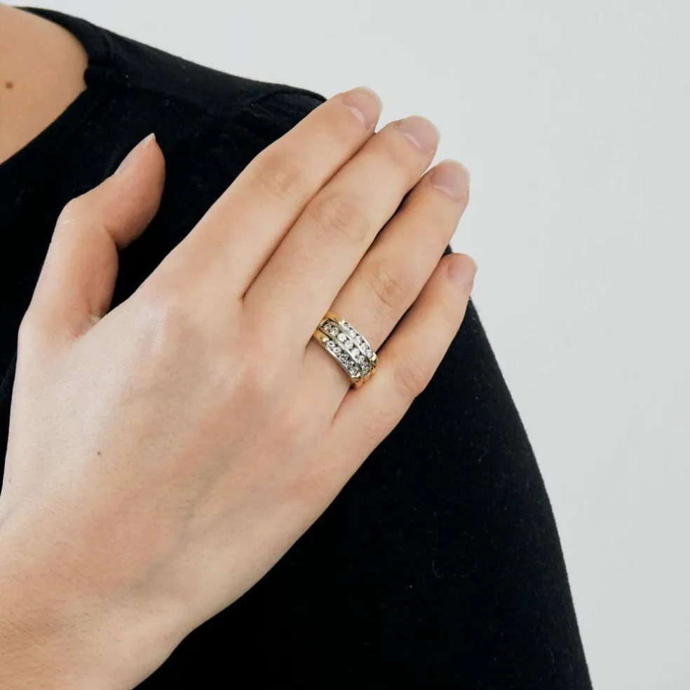 Bague or jaune et gris sertis de diamants