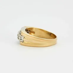 Bague or jaune et gris sertis de diamants