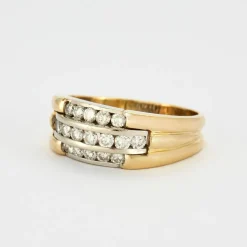 Bague or jaune et gris sertis de diamants