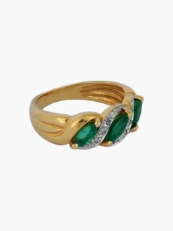 Bague or jaune et émeraudes