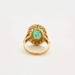 Bague or jaune et émeraude, diamants.