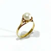 Bague or jaune et perle