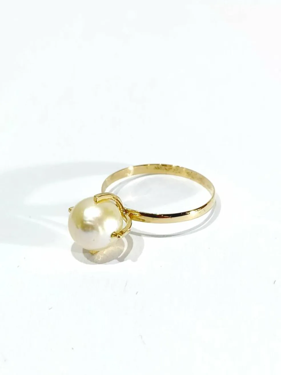 Bague or jaune et perle
