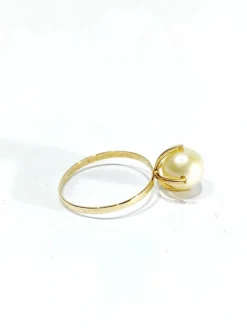 Bague or jaune et perle
