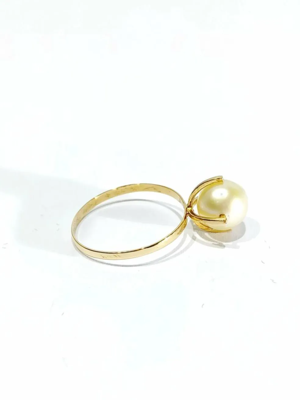 Bague or jaune et perle