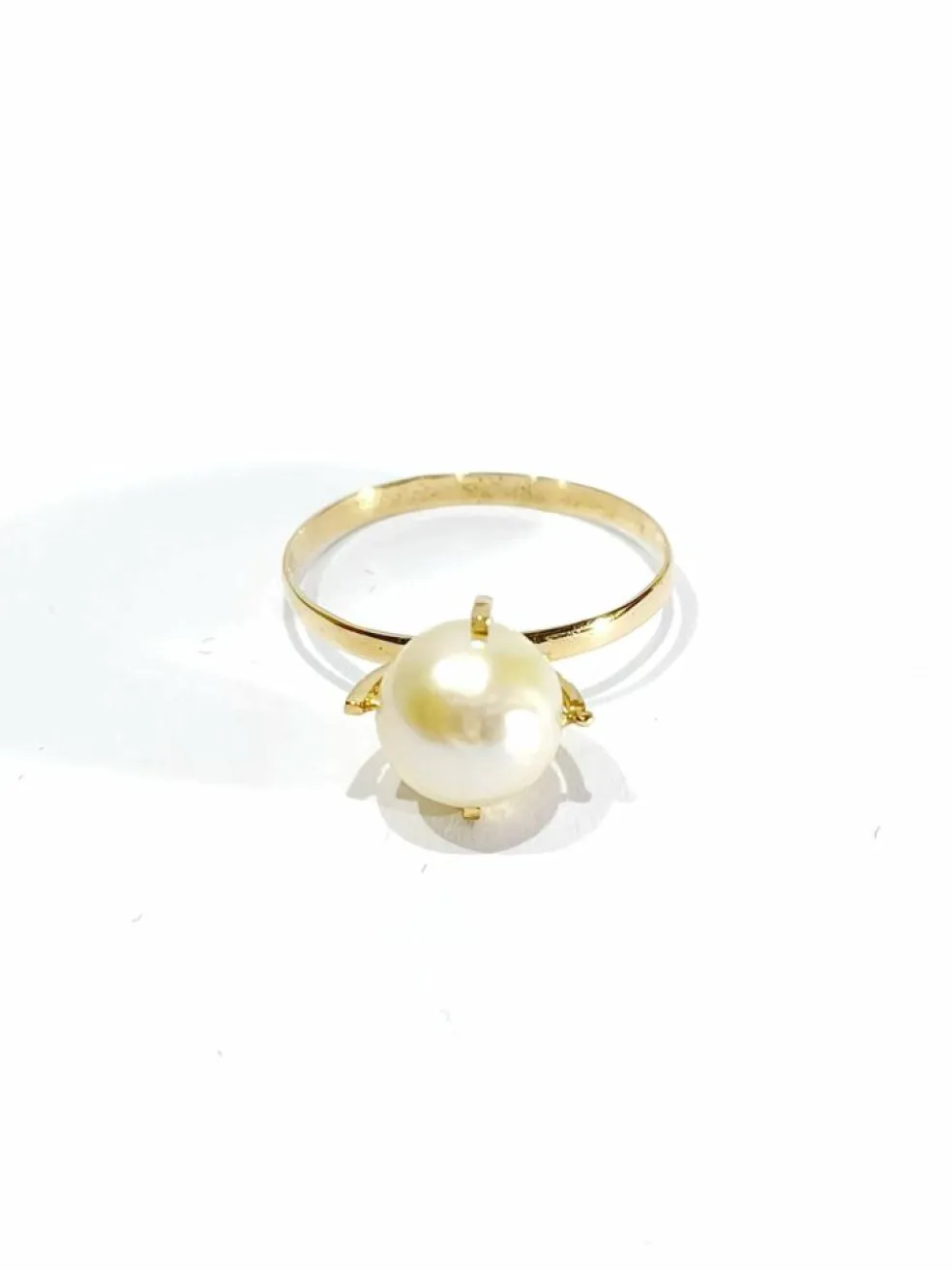 Bague or jaune et perle