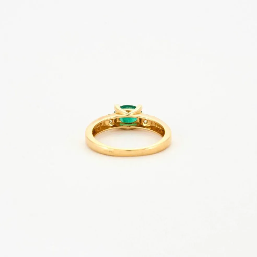 Bague or jaune émeraude ovale et diamants