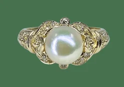 Bague or jaune, perle et 38 diamants
