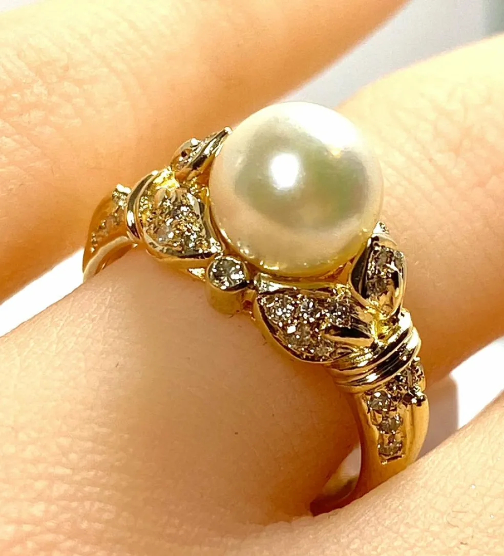 Bague or jaune, perle et 38 diamants