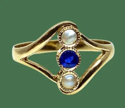 Bague or jaune, perles et pierre bleue