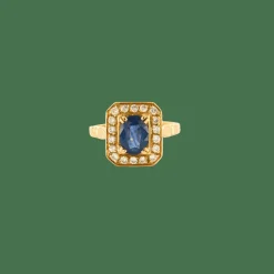 Bague or jaune sertie d’un saphir entouré de diamants