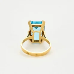 Bague or jaune topaze bleue