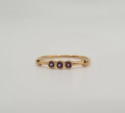 Bague or rose sertie d’améthystes