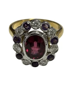Bague ovale festonnée or 2 tons ornée d'une rhodolite