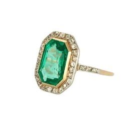 Bague platine et or jaune émeraude et diamants