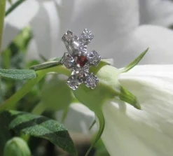 Bague pompadour grenat or blanc