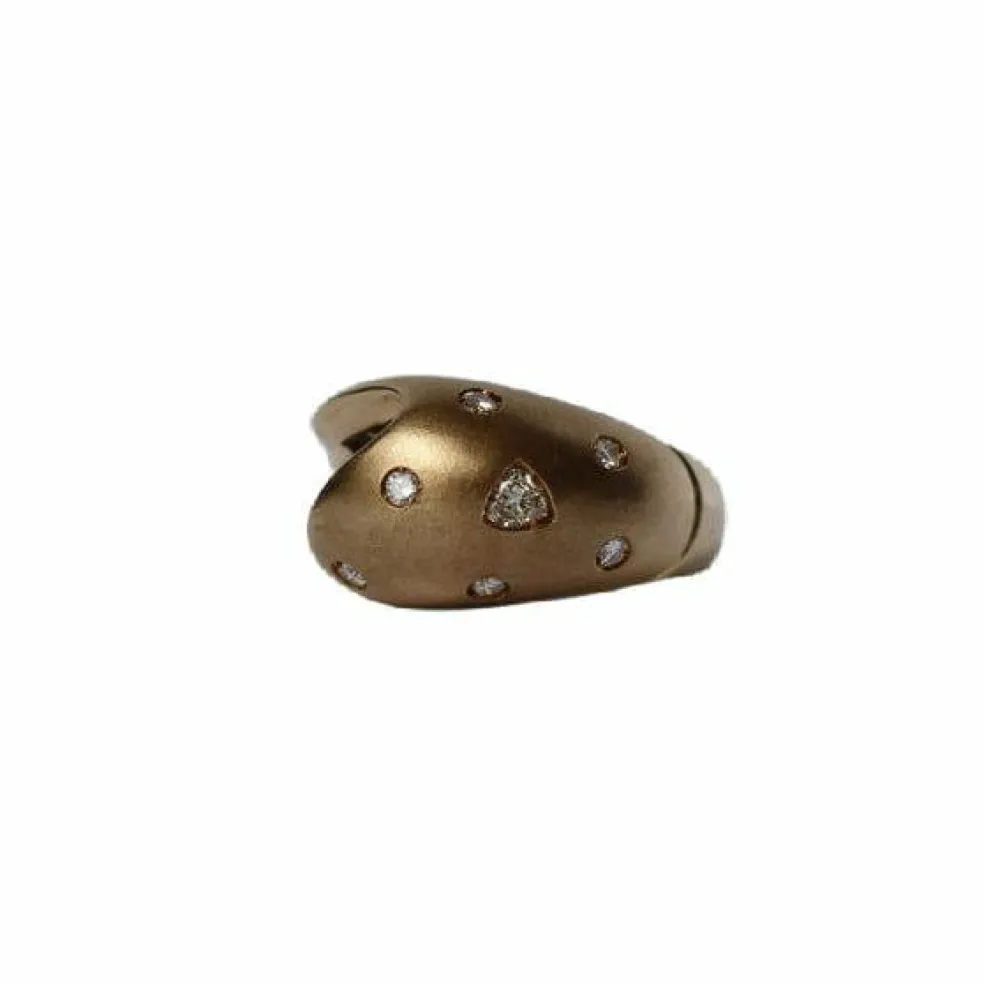 Bague Retro or jaune, diamants ronds et diamant trillion