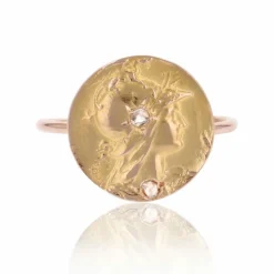 Bague ronde ancienne en or minerve diamantée