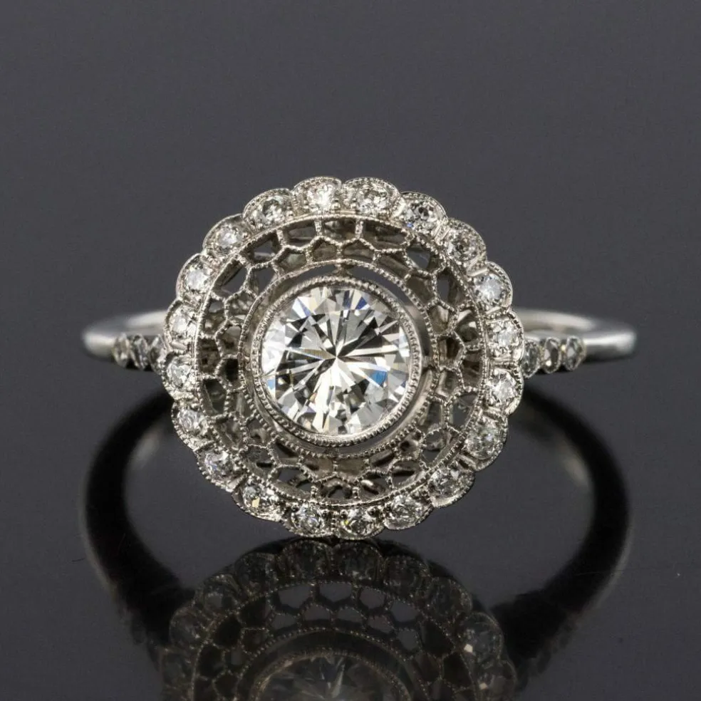 Bague ronde dentelle de platine et diamants
